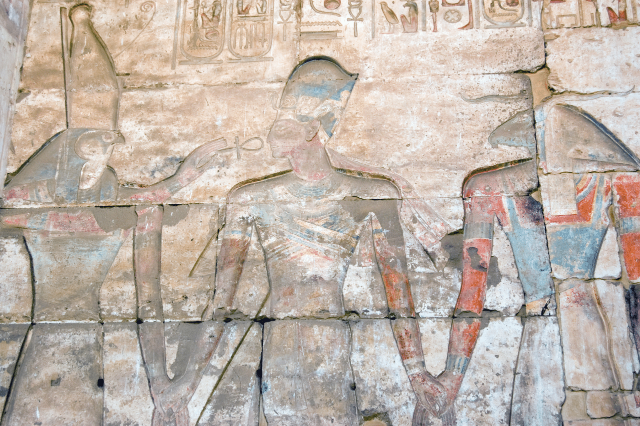Ancient Egyptian hieroglyph showing Horus, Ramses and Khnum