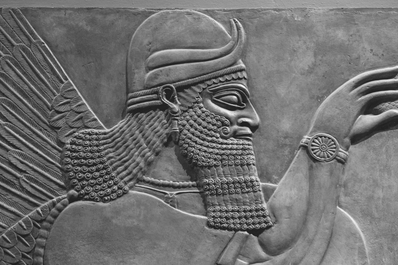 Ancient relief of an Assyrian god