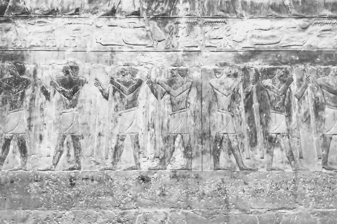 Egyptian hieroglyphics and drawings on the walls Khufu pyramid